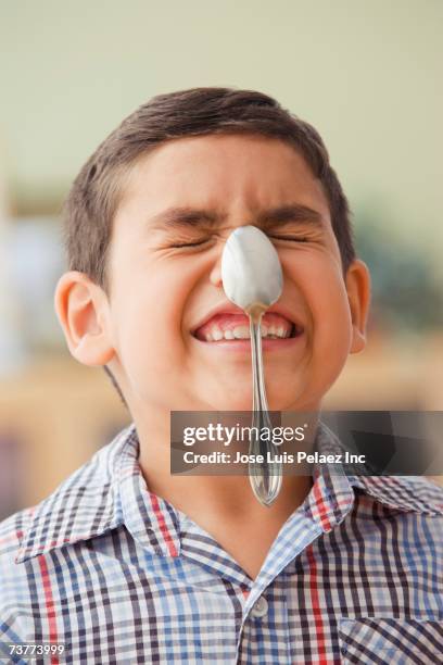 Balance Using Spoon 15 Balance Spoon On Nose Stock Photos, High-Res Pictures, and Images ...