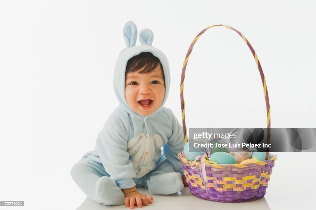 Hispanic baby in Easter Bunny costume