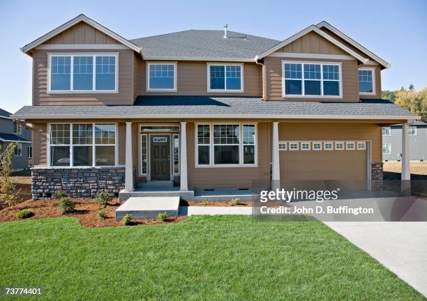 front of house with lawn and driveway - front view stock pictures, royalty-free photos & images