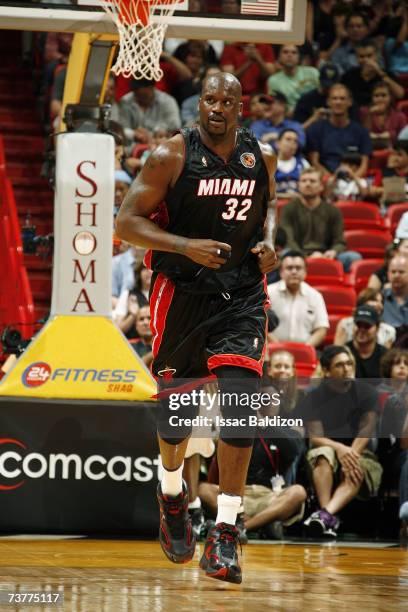 Shaquille O'Neal of the Miami Heat jogs downcourt during the NBA game against the Minnesota Timberwolves at American Airlines Arena on March 9, 2007...