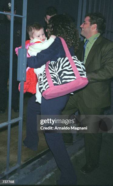 Tatiana Von Furstenberg, carrying baby daughter Antonia Steinberg, and her husband Russell Steinberg arrive at the party to celebrate the wedding of...