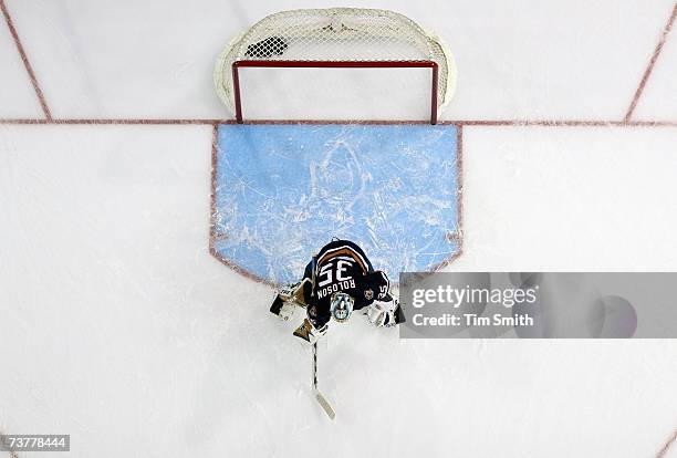 An overhead view as Goalie Dwayne Roloson of the Edmonton Oilers guards the net during the game against the Minnesota Wild at Rexall Place on March...