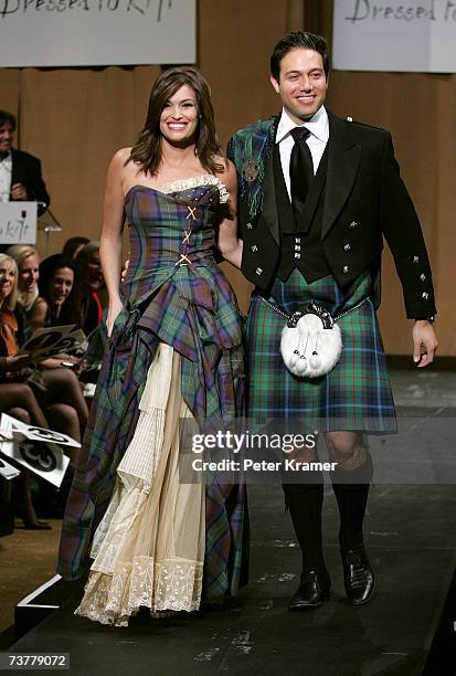 Kimberly Guilfoyle and Eric Villency walk the runway at Johnnie Walker's "Dressed To Kilt 2007" fashion show at Capitale on April 2, 2007 in New York...