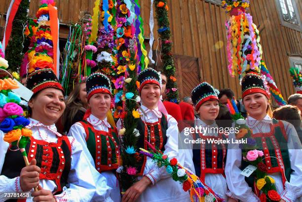 Villagers participate in a Palm Sunday procession between old and new village churches on April 1, 2007 in Lyse, Poland. The procession followed the...