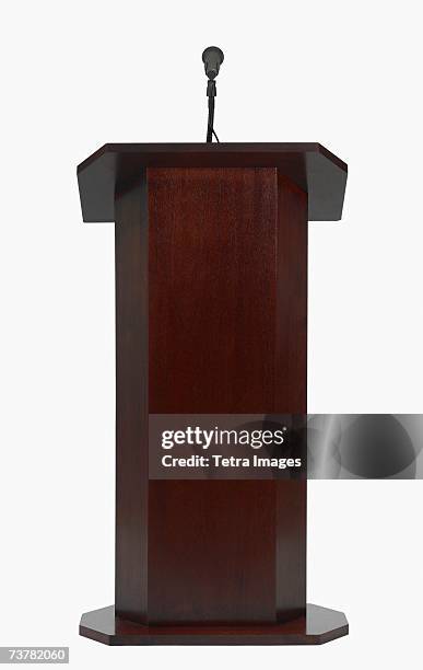 studio shot of podium with microphone - podium microphone stock pictures, royalty-free photos & images