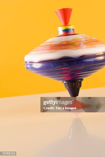 close-up of spinning top - spinning top stock pictures, royalty-free photos & images