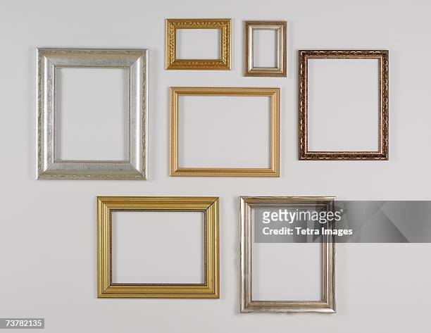 still life of hanging picture frames without pictures - 数個の物 ストックフォトと画像