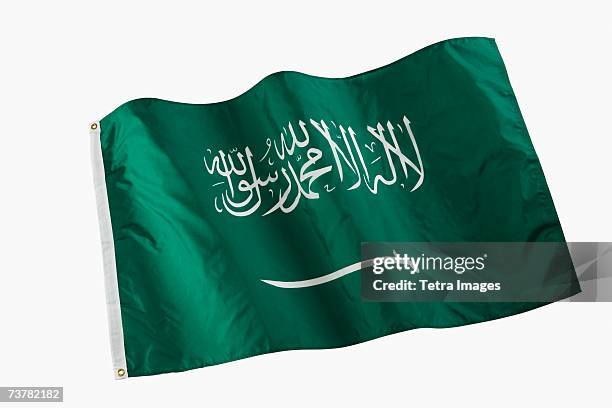 studio shot of national flag - saudi arabian flag stockfoto's en -beelden