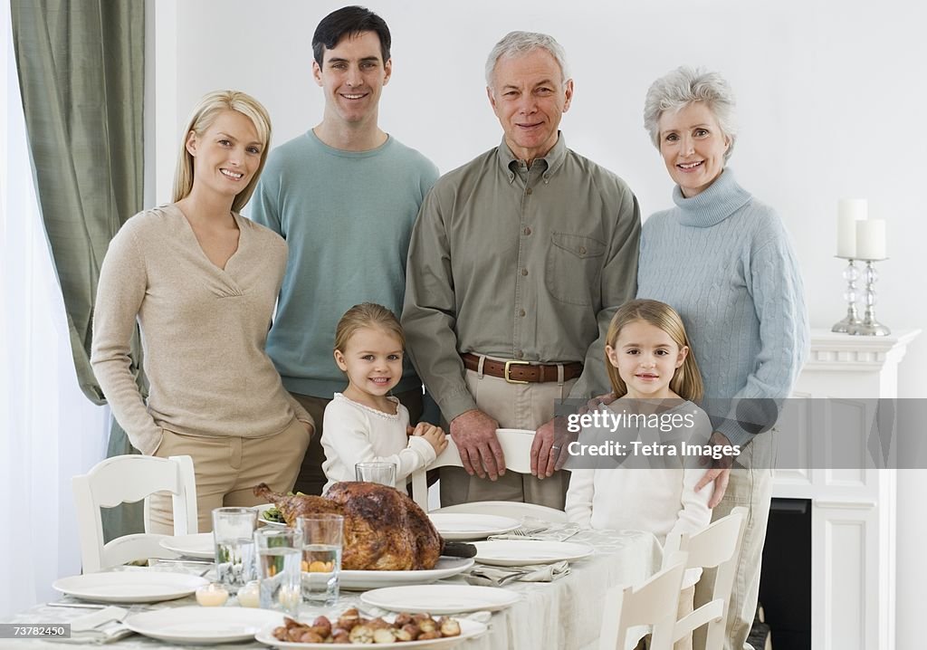 Portrait of family at Thanksgiving table