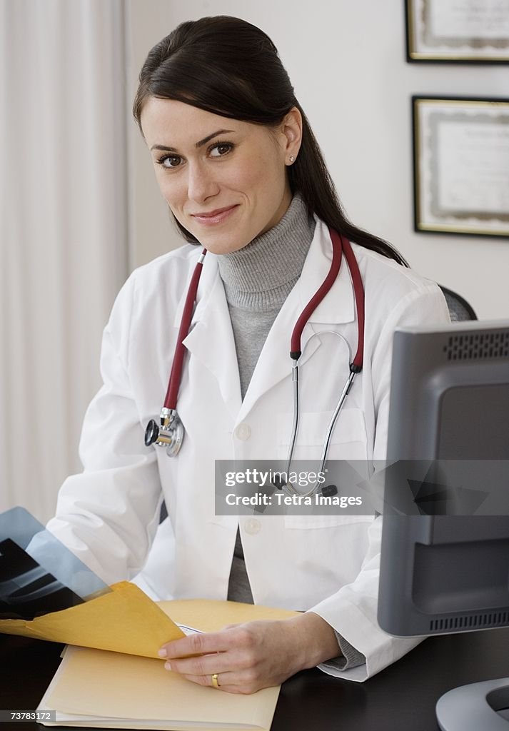 Portrait of female doctor in office