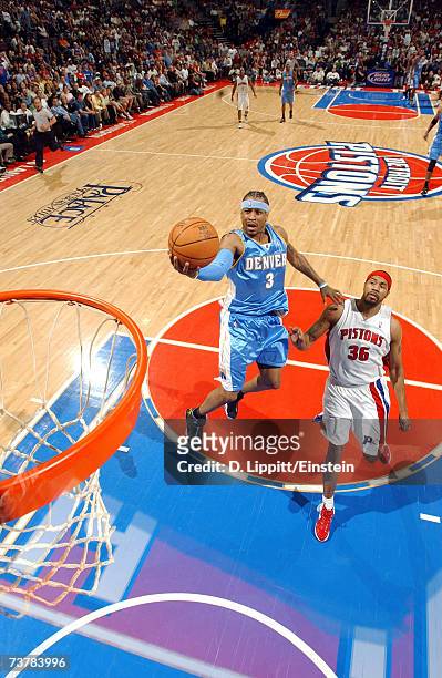 Allen Iverson of the Denver Nuggets goes up for a shot during the game against the Detroit Pistons at The Palace of Auburn Hills on March 26, 2007 in...