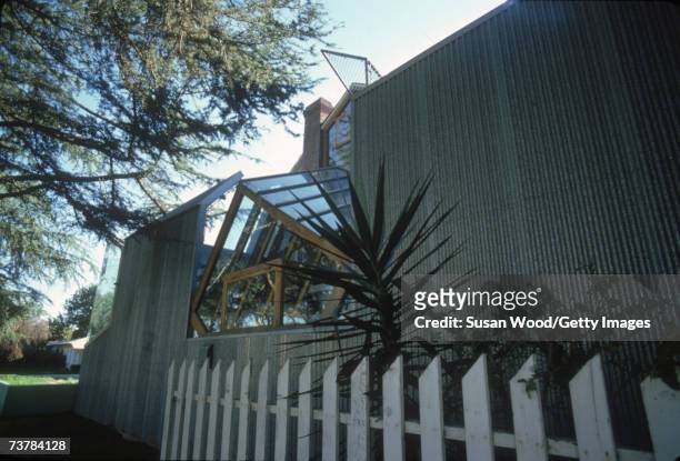 Exterior with white picket fence of Canadian-born American architect Frank Gehry's house, which he designed, Santa Monica, California, January 1980.
