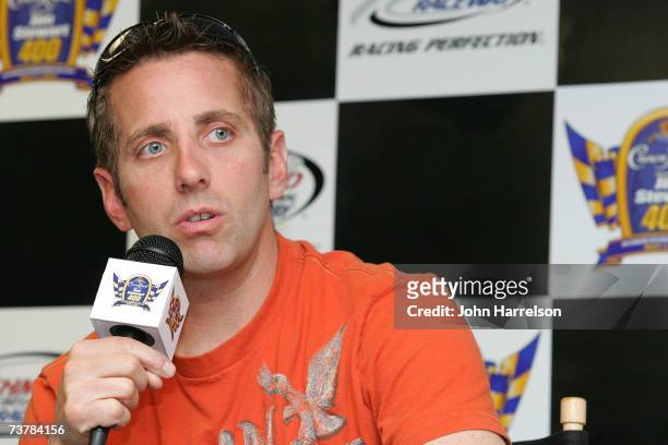 Greg Biffle driver of the Jaskson Hewitt Ford talks to the media during NASCAR Richmond Testing at Richmond International Raceway on April 3, 2007 in...
