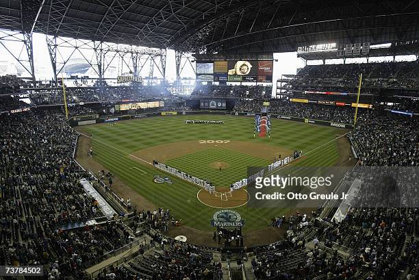 Players line up for the National Anthem before the Seattle Mariners Home Opener against the Oakland Athletics at Safeco Field on April 2, 2007 in...