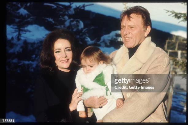 Elizabeth Taylor and Richard Burton hold their granddaughter Leyla January 15, 1973 in Gstaad, Switzerland. Elizabeth Taylor and husband Richard...