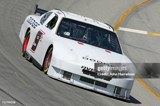 Kasey Kahne driver of the Dodge Dealers / UAW Dodge heads into turn 4 during NASCAR Richmond Testing at Richmond International Raceway on April 3,...