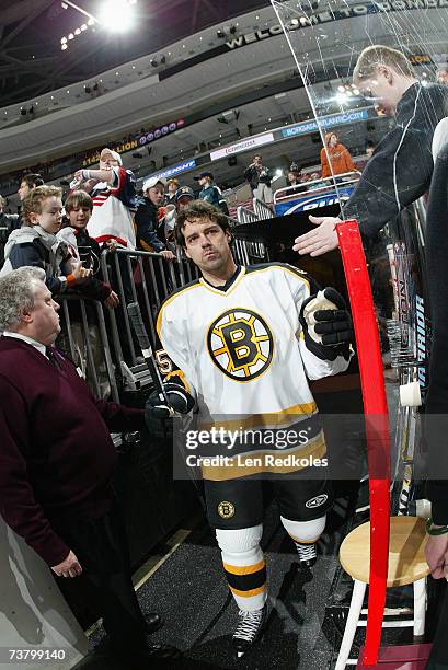 Jason York of the Boston Bruins walks to the ice before the game against the Philadelphia Flyers at Wachovia Center on March 10, 2007 in...