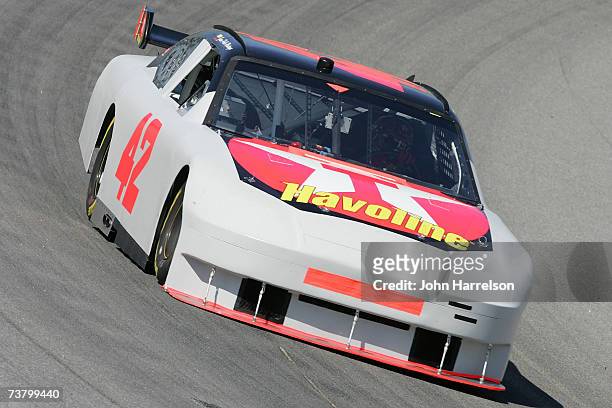 Juan Pablo Montoya driver of the Texaco / Havoline Dodge heads into turn 4 during NASCAR Richmond Testing at Richmond International Raceway on April...
