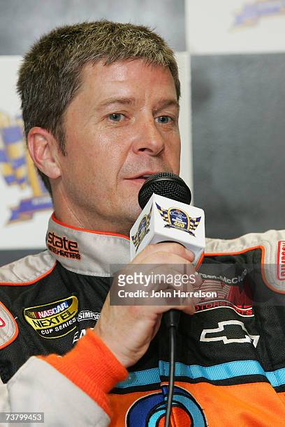 Ward Burton driver of the State Water Heaters Chevrolet talks to the media during NASCAR Richmond Testing at Richmond International Raceway on April...