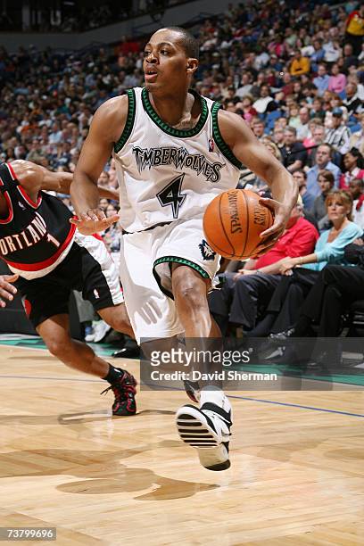 Randy Foye of the Minnesota Timberwolves moves the ball against the Portland Trail Blazers during the game at the Target Center on March 25, 2007 in...