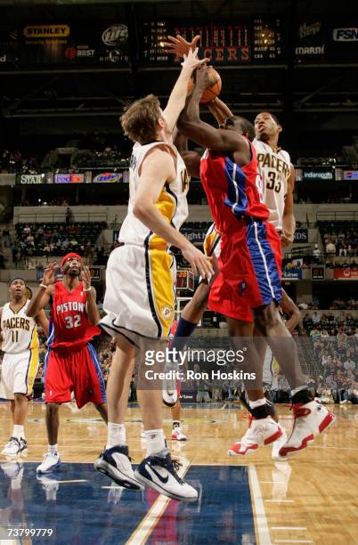Chris Webber of the Detroit Pistons looks for a shot against Troy Murphy and Danny Granger of the Indiana Pacers at Conseco Fieldhouse April 3, 2007...