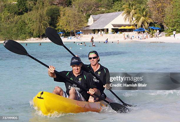 Brad Hogg and Glenn McGrath of Australia paddle a sea kayak in the sea outside the Occidental Grand Pineapple Beach Resort on April 3 in St John's,...