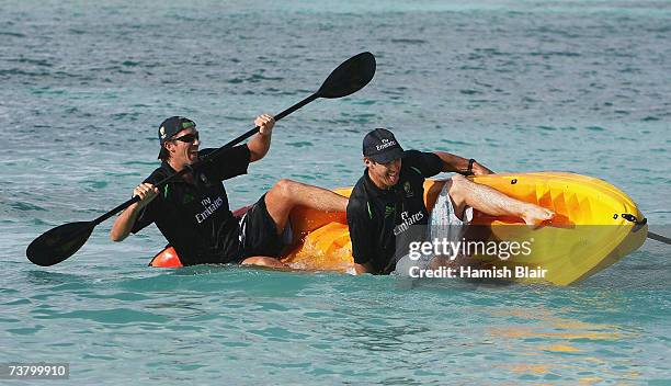 Glenn McGrath and Brad Hogg of Australia capsize a sea kayak in the sea outside the Occidental Grand Pineapple Beach Resort on April 3 in St John's,...