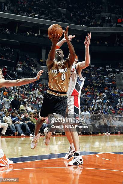 Gilbert Arenas of the Washington Wizards shoots against the Charlotte Bobcats on April 3, 2007 at the Charlotte Bobcats Arena in Charlotte, North...