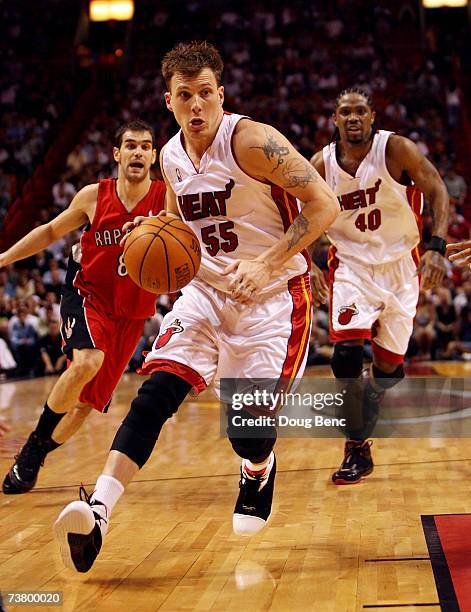 Jason Williams of the Miami Heat drives to the basket after getting past Jose Calderon of the Toronto Raptors at American Airlines Arena on April 3,...