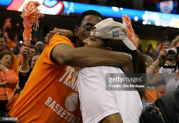 Tournament MVP Candace Parker of the Tennessee Lady Volunteers hugs her father, Larry Parker, as they celebrate Tennessee's 59-46 victory against the...
