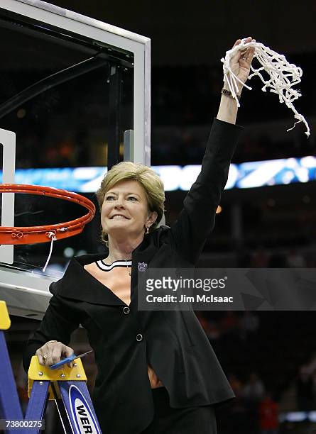 Head coach Pat Summitt of the Tennessee Lady Volunteers celebrates after cutting down the net after Tennessee's 59-46 win against the Rutgers Scarlet...