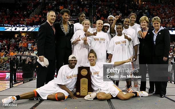 The Tennessee Lady Volunteers pose for a team photo with the trophy after their 59-46 victory against the Rutgers Scarlet Knights to win the 2007...