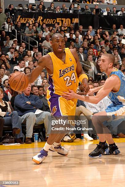 Kobe Bryant of the Los Angeles Lakers drives to the hoop against Steve Blake of the Denver Nuggets on April 3, 2007 at Staples Center in Los Angeles,...