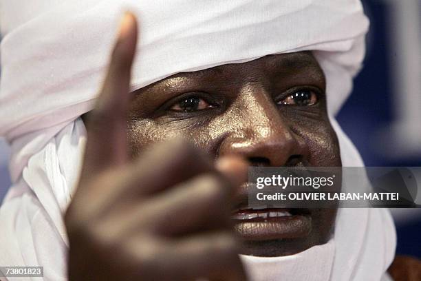 Head of Nigerian association "Aghir N'Man" Almoustapha Alhacen gestures as he delivers a speech during a press conference, 04 April 2007 in Paris....