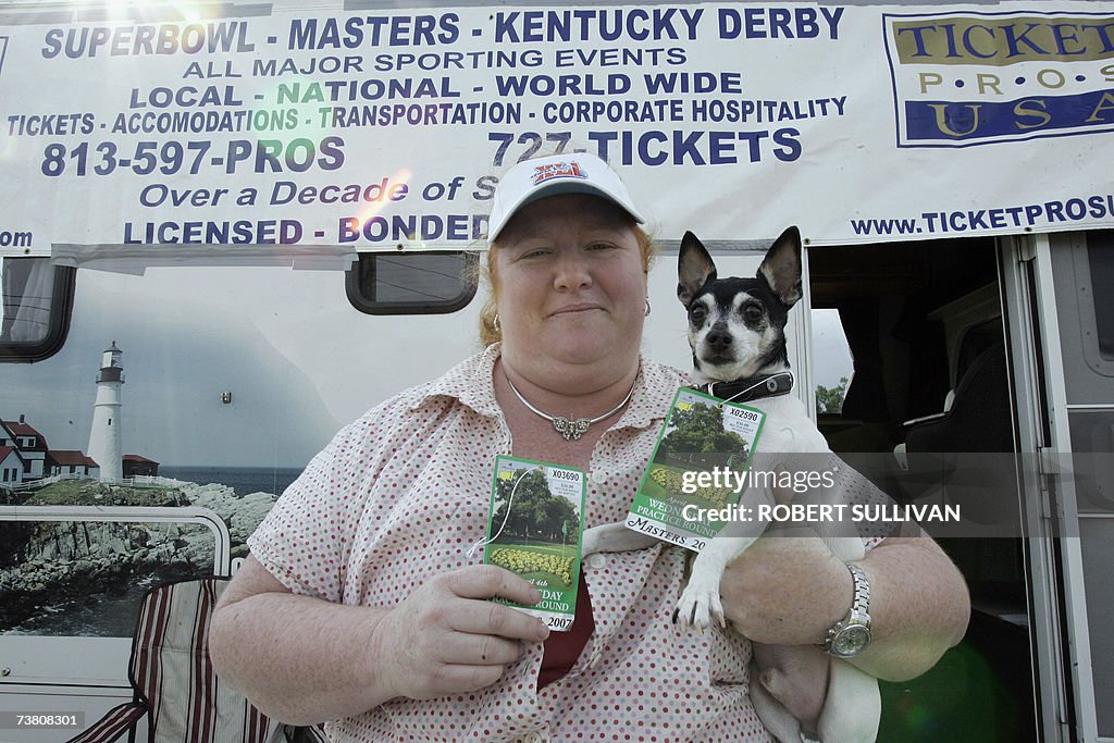 Vendor Sunnie Finkle and her dog Baby se...