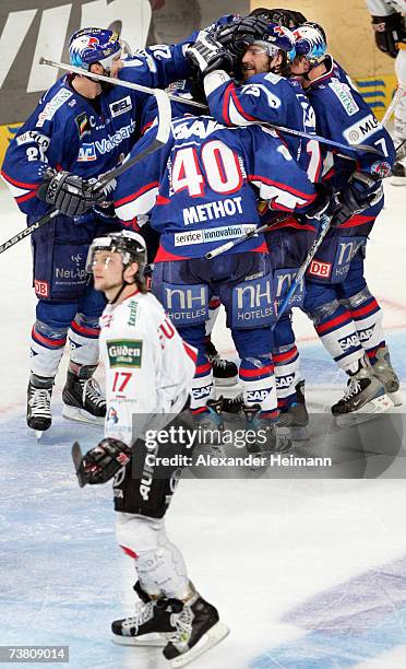 Mannheim players celebrates their victory at the end of the DEL Bundesliga play off semi final game between Adler Mannheim and Cologne Haie at the...