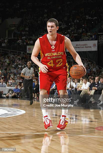 Kevin Love of the West Team dribbles against the East Team during the Boy's McDonald's All American High School Basketball Game on March 28, 2007 at...