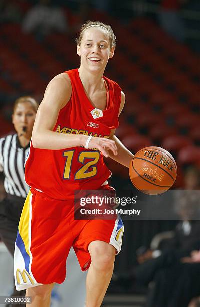 Angie Bjorklund of the West Team dribbles against the East Team during the Girl's McDonald's All American High School Basketball Game on March 28,...