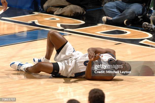 Gilbert Arenas of the Washington Wizards hurts his left knee against the Charlotte Bobcats on April 4, 2007 at the Verizon Center in Washington, DC....