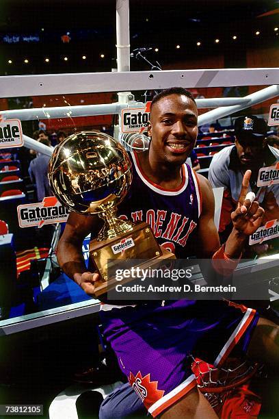 Cedric Ceballos of the Phoenix Suns poses with a trophy after winning the 1992 Gatorade Slam Dunk Contest at the Orlando Arena on February 8, 1992 in...