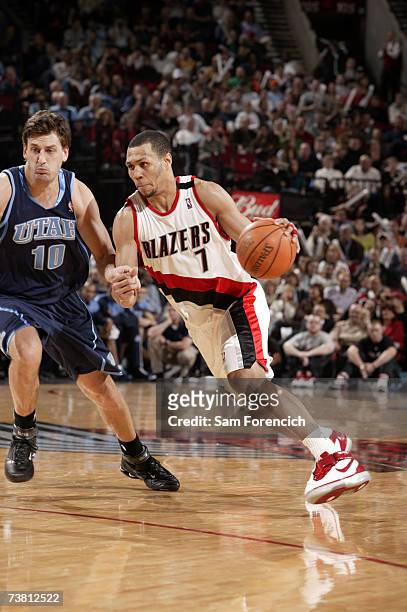 Brandon Roy of the Portland Trail Blazers drives around Gordan Giricek of the Utah Jazz during a game on April 4, 2007 at the Rose Garden Arena in...