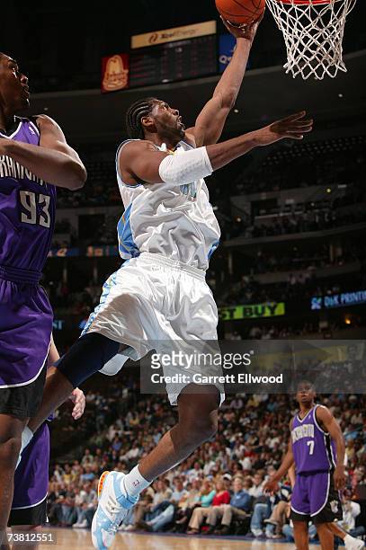 Nene of the Denver Nuggets goes to the basket against the Sacramento Kings on April 4, 2007 at the Pepsi Center in Denver, Colorado. NOTE TO USER:...