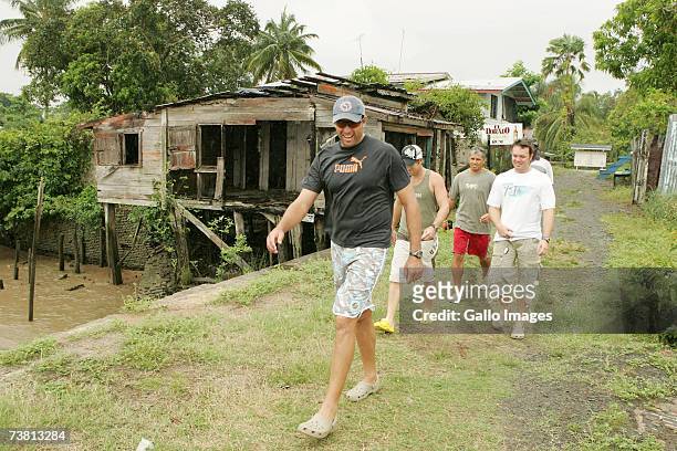 Justin Kemp strolls at Flag Island during the South Africa Cricket team's open-boat river trip up the Essequibo and Mazaruni Rivers on April 4, 2007...