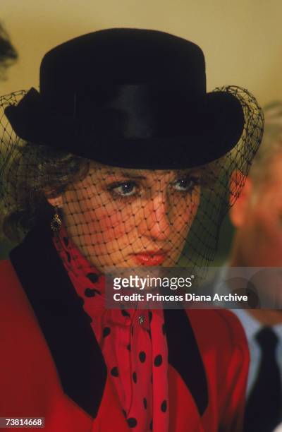 The Princess of Wales wears a black veiled hat to the Birthright Centre in Sheffield Hospital, April 1986.