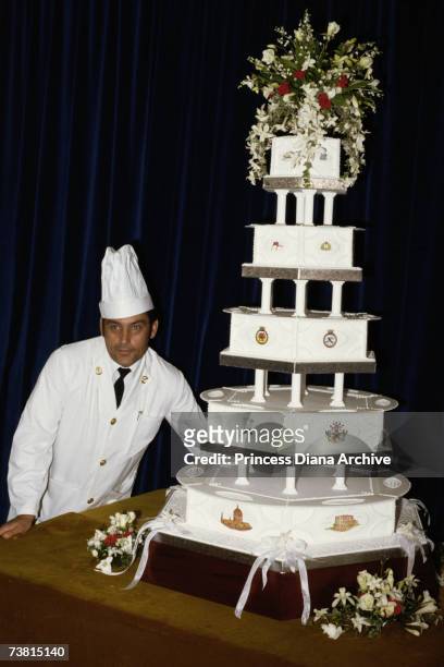 Chief petty officer cook David Avery with the royal wedding cake made for Prince Charles and Princess Diana's wedding, 29th July 1981.