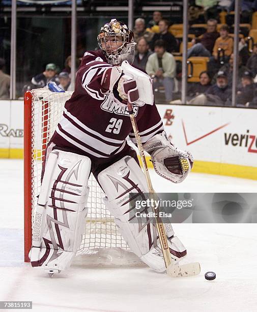 Goaltender Jon Quick of the Massachusetts Minutemen handles the puck during the game against the New Hampshire Wildcats durng the Hockey East...