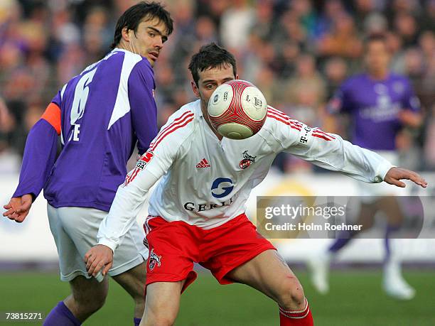 Joerg Emmerich of Aue and Fabrice Ehret of Koeln during the Second Bundesliga match between Erzgebirge Aue and 1.FC Cologne at the Erzgebirgs stadium...