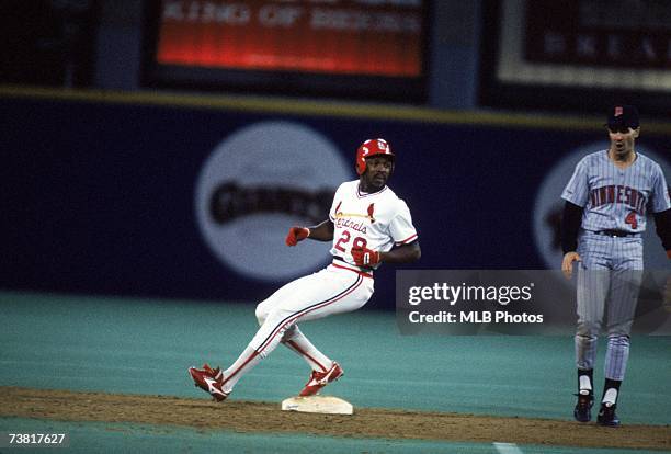 Left fielder Vince Coleman of the St. Louis Cardinals reaches second base during the 1987 World Series game against the Minnesota Twins on October...