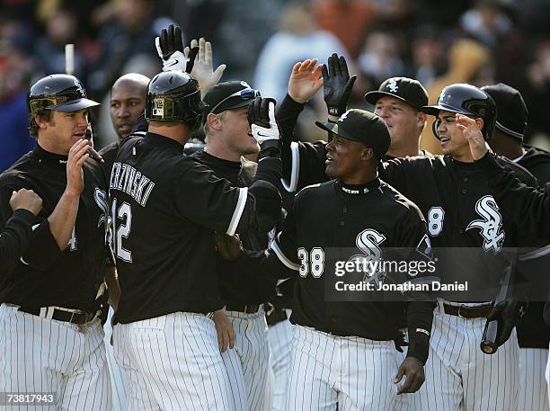 Pierzynski of the Chicago White Sox is congratutlated by teammates including Joe Crede , Pablo Ozuna and Alex Cintron after being hit by a pitch with...