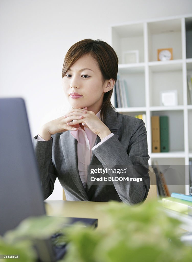 Japanese woman using a laptop computer